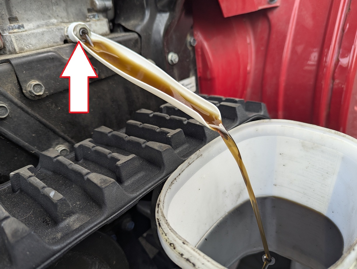Note the arrow, you'll need to plug that otherwise there will be a little oil leakage